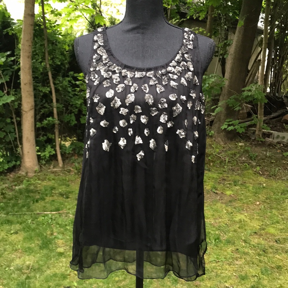 Top with sequin embellishments